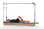 <p><strong>Setup</strong></p><ul><li><p>Lying supine in neutral spine position, legs parallel, one leg perpendicular to mat, one foot in strap, plantarflexed, other leg placed on mat, leg straight, foot plantarflexed, hands holding F2 Handles, arms bent at 90 degrees in elbow and shoulder joint or arms straight overhead, holding poles, thumbs wrapped around poles</p></li><li><p>Socket: F, Lever Orientation: 0, Lever Length: 1, Lever Direction: 2, Connector:N/A, Spring: N/A</p></li><li><p>Resistance: light to medium</p></li></ul><p><strong>Movement</strong></p><ul><li><p>Exhale: Bend knee, bringing leg toward the mat, straighten leg along the mat</p></li><li><p>Inhale: Lift leg, return to start position</p></li></ul><p><strong>Muscle Focus</strong></p><ul><li><p>Hip extensors</p></li><li><p>Knee extensors</p></li><li><p>Spinal flexors</p></li><li><p>Spinal extensors</p></li></ul><p><strong>Objectives</strong></p><ul><li><p>Hip extensor control</p></li><li><p>Hip disassociation</p></li><li><p>Pelvic lumbar stabilization</p></li></ul><p><strong>Cues</strong></p><ul><li><p>Maintain spring tension</p></li><li><p>Establish L shape with legs in each cycle</p></li><li><p>Keep leg parallel avoiding hip external rotation</p></li><li><p>Maintain pelvic lumbar stabilization</p></li><li><p>Keep supporting leg elongated and stable</p></li></ul><p></p>