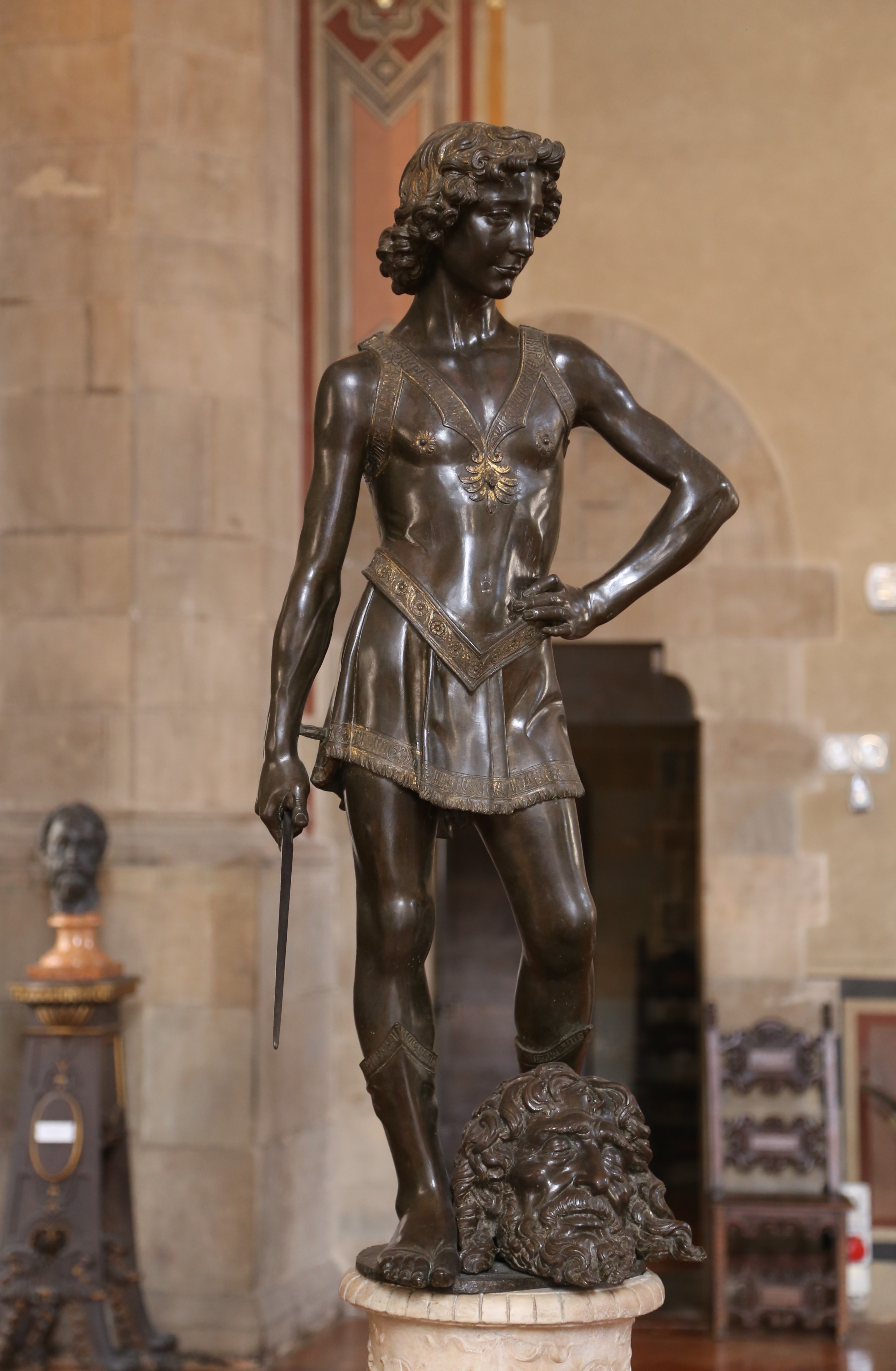 <p>Artist:<br>Title:<br>Period/movement:<br>Format:<br>Material/medium:<br><br><strong>Human problem/function:</strong> Verrocchio reworked a familiar civic hero so a new audience could recognize a different ideal of youthful confidence and public presence.</p><p><strong>Zone 2 — See and decode it</strong></p><p class="code-line"><strong>Recognition clues:</strong></p><ol><li><p>Clothed adolescent</p></li><li><p>Hand on hip</p></li><li><p>Short sword</p></li><li><p>Goliath's severed head between his feet</p></li><li><p>Alert, confident expression <strong>Visible evidence:</strong> Open stance and projecting limbs engage surrounding space more sharply than Donatello's languid figure.<br><strong>Psychology/attention:</strong> Open posture, direct expression, and hand-on-hip stance communicate social confidence more explicitly than Donatello's inward, ambiguous pose.</p></li></ol><p><strong>Zone 3 — Connect and explain it</strong></p><p class="code-line">This David presents victory as witty, youthful self-possession. Comparing it with Donatello's version shows how one civic symbol can be redesigned to project different ideals of body, character, and leadership. <strong>Portable insight:</strong> The same story can train different character ideals depending on posture, clothing, expression, and the moment selected.</p><p><strong>Zone 4 — Study references</strong></p><p class="code-line"><strong>Note-taking guide:</strong> The Chapter 21 guide invites comparison with the other bronze David: clothing, open posture, and direct confidence create a different civic personality.<br><strong>Worksheet:</strong> Chapter 21, Question 3: the sculptor of this David later taught Leonardo. Chapter 22, Question 2 reverses that same apprenticeship relationship.</p>