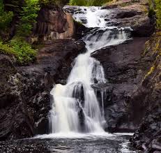 <ul><li><p>waterfalls that flow from high potential to low potential </p></li><li><p>start at different heights and are different heights (have different voltages) </p></li><li><p>but the current has to stay the same otherwise the water would run out or overflow (current has to be the same) </p></li></ul><p></p>