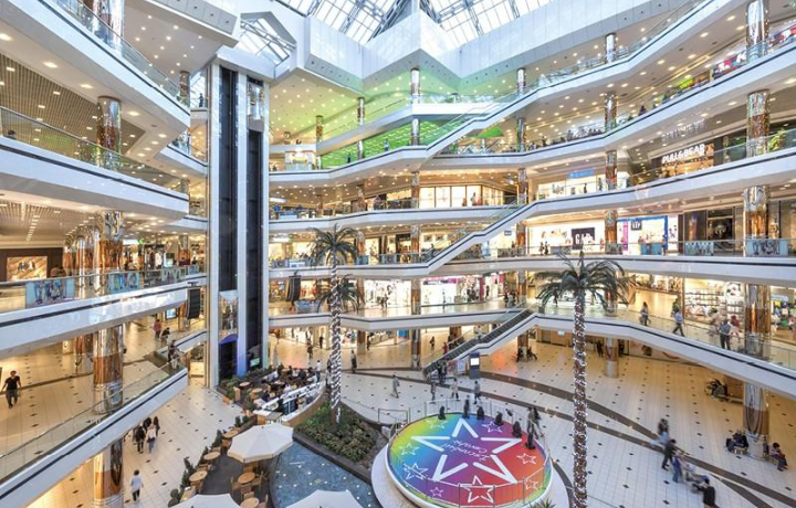 <p>An enormous, fully enclosed complex that houses dozens or hundreds of separate businesses, restaurants, and entertainment venues under one roof.</p>