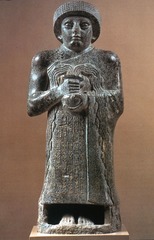 <p>overflowing water jar Gudea holds symbolizes the prosperity he brings to the people of Lagash; Mesopotamian art, normally only gods and goddesses are the sources of lifegiving water</p>