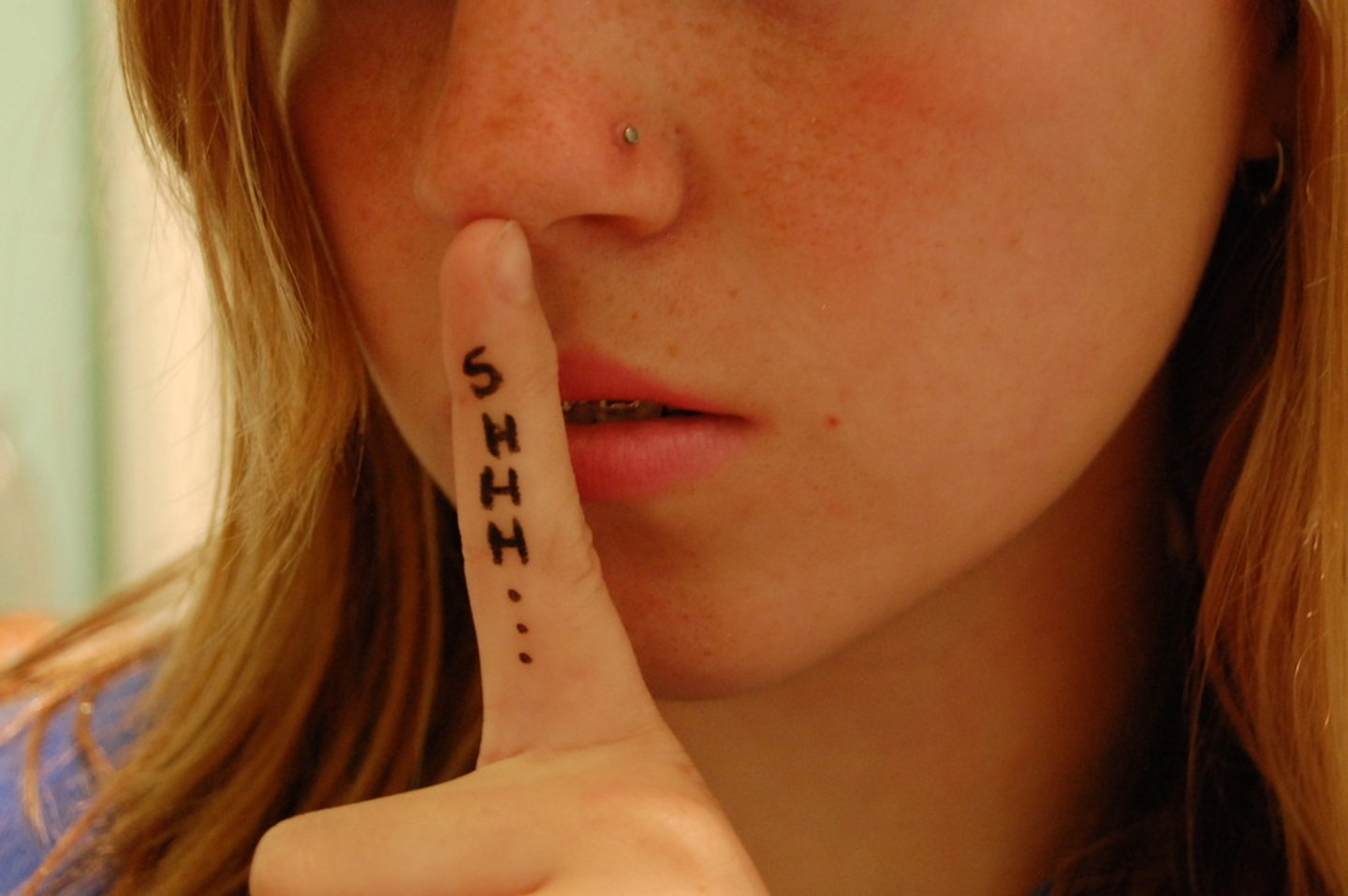 <p>kept secret or done secretively, especially because illicit.</p>