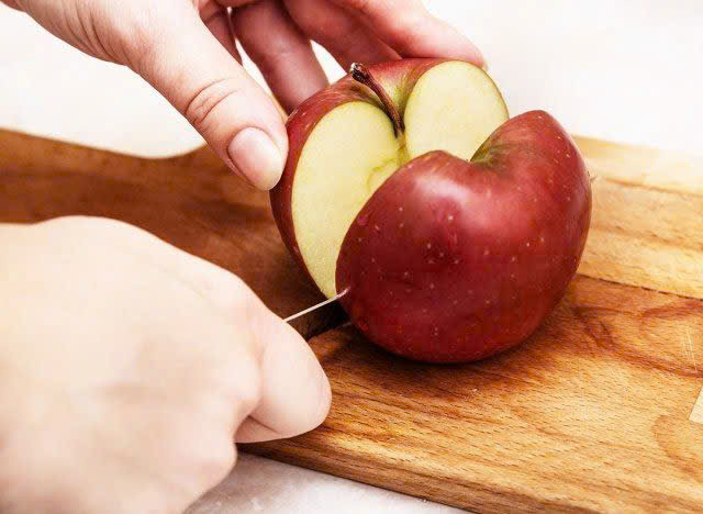 <p>Cắt làm đôi.</p><p><strong>Cut</strong> the cake <strong>in half</strong>, please! (Cắt giùm tao cái bánh làm đôi đi!)</p>