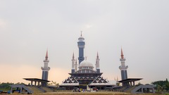 <p>A student examining a mosque asks why many mosques include a tall tower known as a minaret. Which teacher response would be MOST accurate?</p>