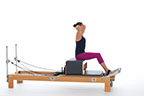 <p><strong>Setup</strong></p><ul><li><p>Starting in Flat Back position (page 31)</p></li><li><p>Resistance: <strong>all springs attached to hold carriage in place</strong></p></li></ul><p><strong>Movement</strong></p><ul><li><p>Inhale: Arc trunk to one side</p></li><li><p>Exhale: Lift back to center, return to start position</p></li><li><p>Inhale: Arc trunk to opposite side</p></li><li><p>Exhale: Lift back to center, return to start position</p></li><li><p>Alternate sides</p></li></ul><p><strong>Muscle Focus</strong></p><ul><li><p>Spinal lateral flexors</p></li><li><p>Spinal flexors</p></li><li><p>Spinal extensors</p></li></ul><p><strong>Objectives</strong></p><ul><li><p>Spinal lateral flexor control and stretch</p></li><li><p>Spinal flexor control</p></li><li><p>Spina extensor control</p></li></ul><p><strong>Cues</strong></p><ul><li><p>Maintain co-contraction of abdominals and back extensors</p></li><li><p>Keep both sit bones in contact with box as trunk arcs over</p></li><li><p>Keep elbows wide and head aligned with spine</p></li><li><p>Touch fingers loosely behind head</p></li><li><p>Keep pelvis stable</p></li></ul><p></p>