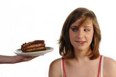 <p>to stop resisting something you want</p><p>He tried to diet but eventually g___ i_ t_ t__________ and ordered pizza. </p><p>Don't g___ i_ t_ t__________ to check your phone every minute.</p>
