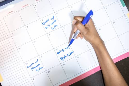 <p>As soon as you receive an invitation to an important client meeting, you immediately add it to your calendar.</p><p>What do you do with the meeting date? Use a phrasal verb.</p>