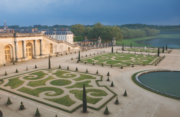 <p>in French "an embroidered parterre," meaning a lawn shaped to imitate</p><p>the decorative geometric forms of the kind found on a carpet.</p>