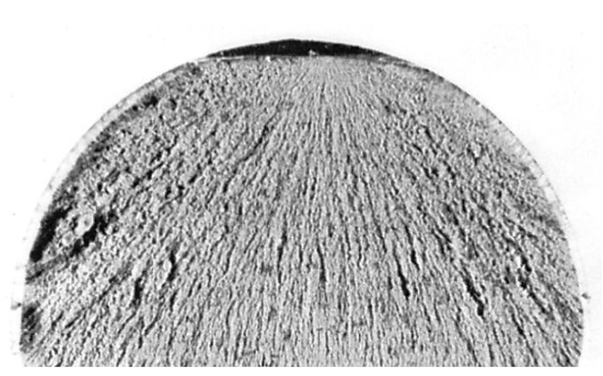 <p>Chevron patterns (V-shaped markings) point to failure point</p>
