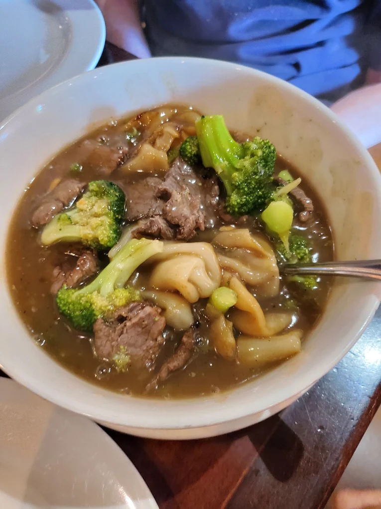 <p>FAT noodles w/ a “gravy” like sauce</p>