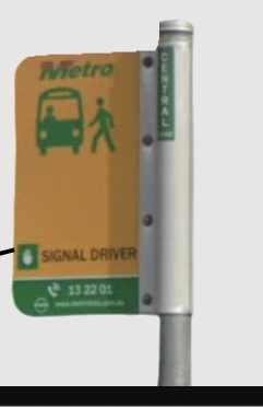 <p>Yellow and green card bus stop</p>