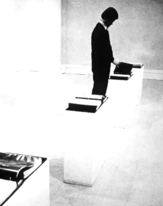 <p>1966 An early exhibition of photocopied studio scraps (like Donald Judd’s hardware store receipt) displayed in ring binders, establishing the movement’s "office" aesthetic</p>