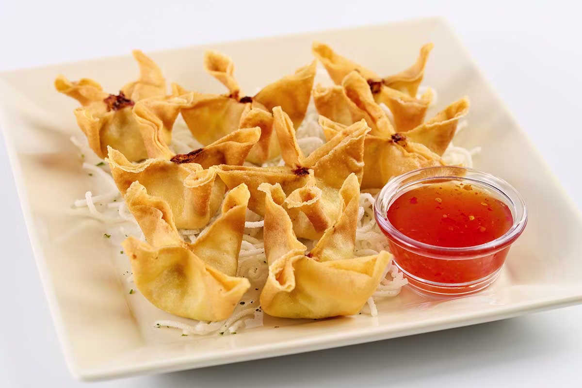 <p>Classic crab Rangoon with crab cream cheese and green onion, fried crisp and served with sweet chili sauce.</p>