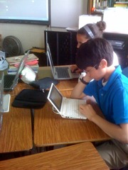 <p>In the class, there is a desk</p>