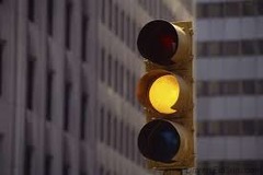 <p>Stop or safely clear intersection</p>