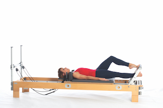<p><strong>Setup</strong></p><ul><li><p>Lying supine in neutral spine position, legs straight and parallel, toes placed on footbar, feet hip width apart and plantarflexed</p></li><li><p>Resistance: medium to heavy | <strong>Springs: 3R or 3R+ 1B</strong></p></li></ul><p><strong>Movement</strong></p><ul><li><p>Inhale: Lower one heel and lift other simultaneously, switch</p></li><li><p>Exhale: Lower one heel, and lift other simultaneously, switch</p></li><li><p>Final Exhale: Lift both heels, return to start position</p></li></ul><p><strong>Muscle Focus</strong></p><ul><li><p>Ankle-foot plantarflexors</p></li><li><p>Ankle-foot dorsiflexors</p></li></ul><p><strong>Objectives</strong></p><ul><li><p>Ankle-foot plantarflexor strength</p></li><li><p>Ankle-foot dorsiflexion control</p></li><li><p>Pelvic lumbar stabilization</p></li></ul><p><strong>Cues</strong></p><ul><li><p>Work both feet equally in full range of motion</p></li><li><p>Straighten legs and plantarflex feet completely between each repetition</p></li><li><p>Maintain pelvic lumbar stabilization</p></li></ul><p></p>