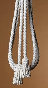 <p>long cord worn over the alb, used for fastening alb at waist, symbolizes the virtue of chastity</p>
