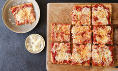 <p>A clean simple cheese pizza, shredded mozzarella and tomato sauce.</p><p>*guests can decide whether sliced or not*</p><p>Modifications: no cheese</p><p>Allergens: dairy, garlic</p>