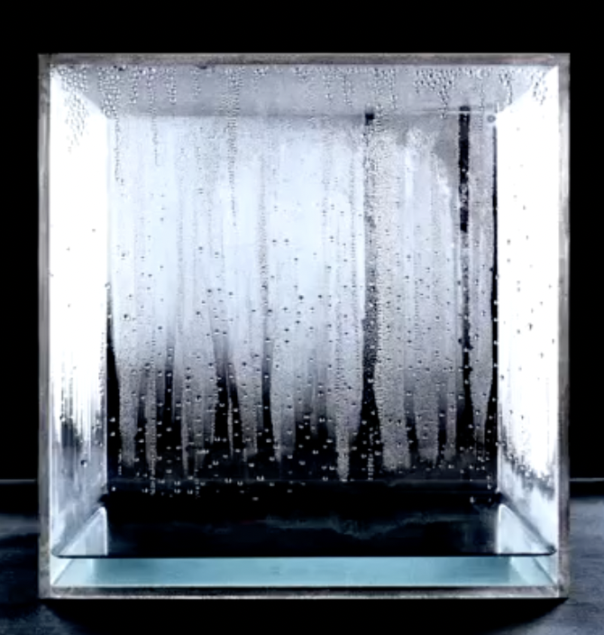 <p>1963–65; sealed cube where condensation forms, showing environmental systems in action</p>