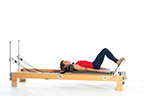 <p><strong>Setup</strong></p><ul><li><p>Lying supine in neutral spine position, legs parallel, toes and balls of feet wrapped around footbar (Prehensile position), feet hip width apart, heels pressing down</p></li><li><p>Resistance: medium to heavy | <strong>Springs: 3R or 3R+ 1B</strong></p></li></ul><p><strong>Movement</strong></p><ul><li><p>Exhale: Straighten legs</p></li><li><p>Inhale: Bend legs, return to start position</p></li></ul><p><strong>Muscle Focus</strong></p><ul><li><p>Hip extensors</p></li><li><p>Knee extensors</p></li></ul><p><strong>Objectives</strong></p><ul><li><p>Hip extensor control</p></li><li><p>Knee extensor strength</p></li><li><p>Ankle-foot dorsiflexor control</p></li><li><p>Foot stretch</p></li><li><p>Pelvic lumbar stabilization</p></li></ul><p><strong>Cues</strong></p><ul><li><p>Initiate movement with hip extensors</p></li><li><p>Straighten legs completely</p></li><li><p>Keep heels pressing down throughout movement</p></li><li><p>Maintain wrapped position of toes and balls of feet</p></li><li><p>Maintain pelvic lumbar stabilization</p></li></ul><p></p>