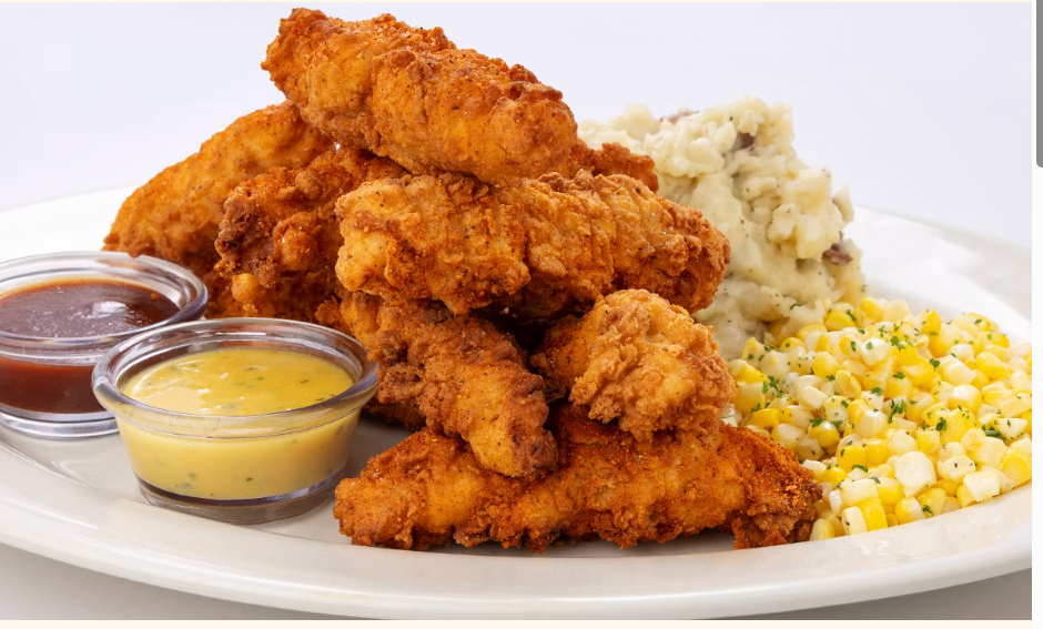 <p>Chicken Tenders Breaded and Fried Crisp. Served with Mashed Potatoes, Fresh Buttered Corn and Dipping Sauces</p>
