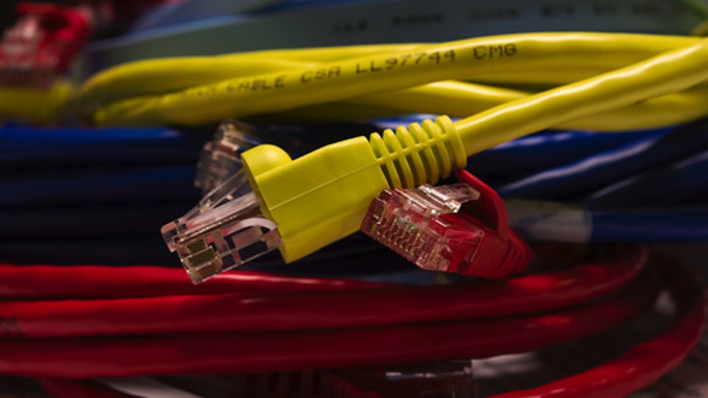 <p>the lowest, or first, layer of the OSI model. Protocols in this layer generate and detect signals so as to transmit and receive data over a network medium. These protocols also set the data transmission rate and monitor data error rates, but do not provide error correctionn</p>