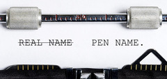 <p>(n.) a pen name, name assumed by a writer</p>