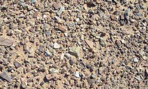 <p><span>The figure below is a desert pavement from the Mojave Desert, in southeastern California. This </span><strong>accumulation of coarse sediment</strong><span> was left behind when wind erosion </span><strong>blew away fine-grained sediment</strong><span>. This type of deposit, typical of desert environments, is called ..</span></p>