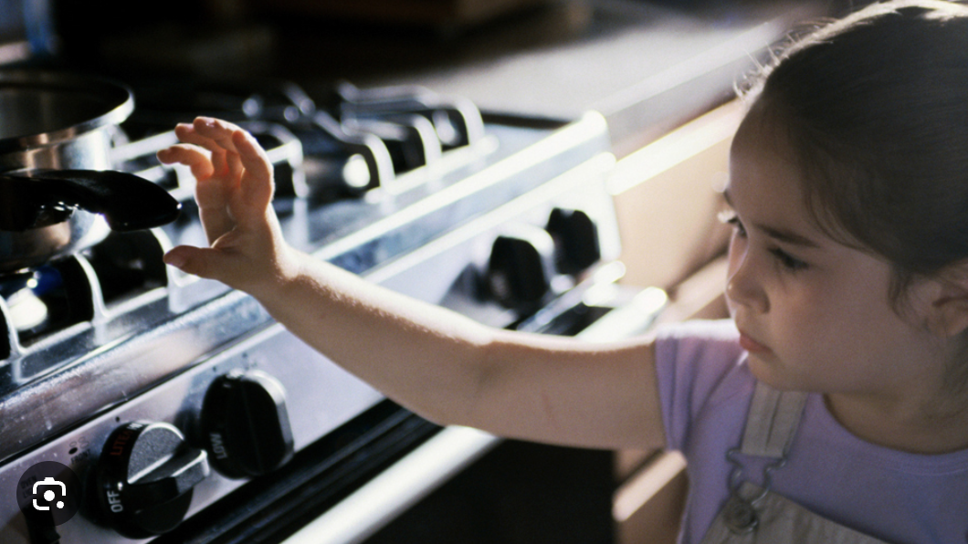 <p>touching a hot stove</p>