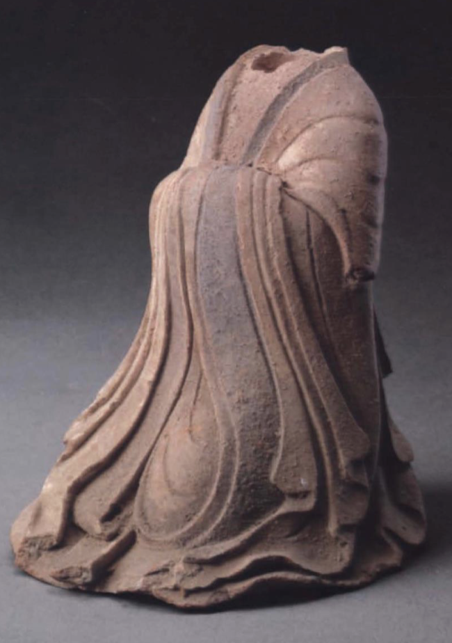 <p>Headless standing figure</p>