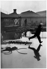 <p>The photograph taken by Henri Cartier-Bresson BEST illustrates:</p>