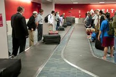 <p>to pick up, to claim the luggage</p>