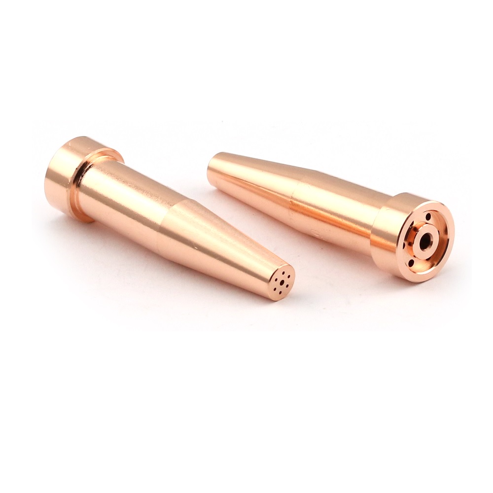<p>Replaceable oxy-fuel torch tip with central oxygen orifice and surrounding preheat holes, used to direct cutting oxygen stream that oxidizes and cuts metal.</p>