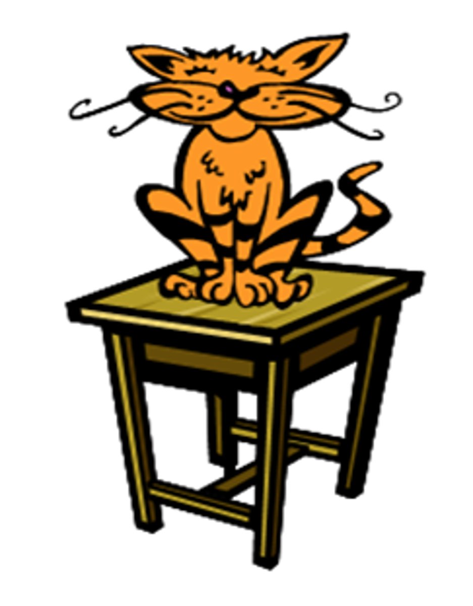<p>el gato está ... la mesa</p>