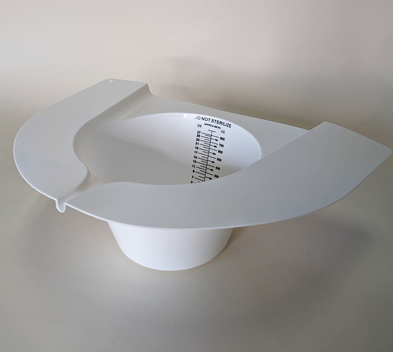 <ul><li><p>Plastic collection container placed into toilet bowl to collect and measure urine or stool </p></li></ul><p></p>