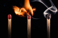 <p>rapid chemical combination of a substance with oxygen, involving the production of heat and light</p>