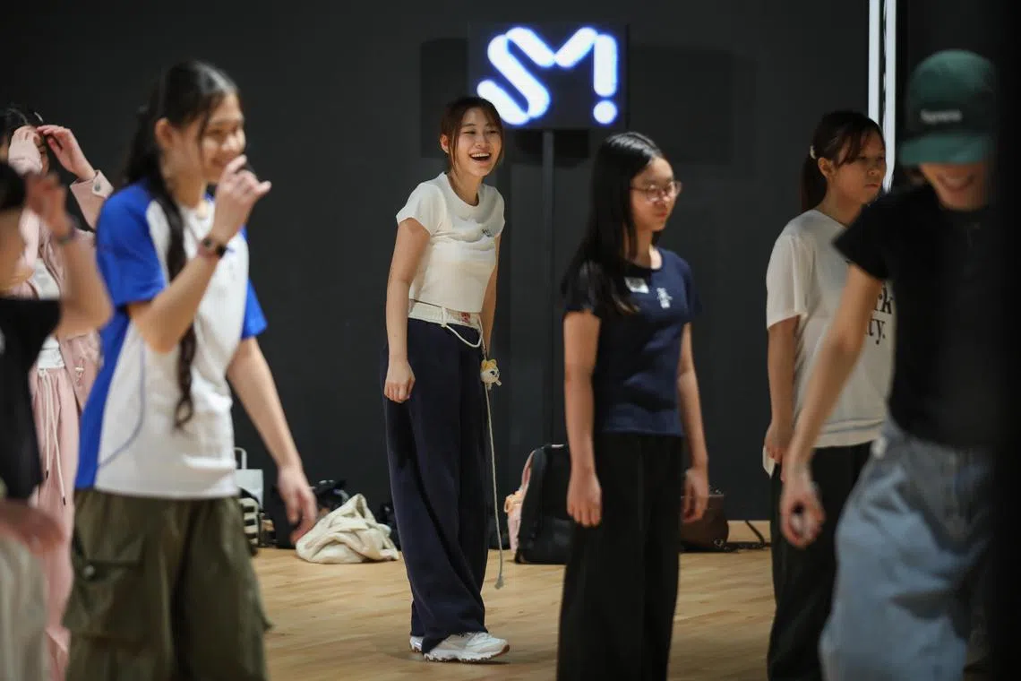 <p>Led by SM Entertainment; systematic training in dance, vocals, language, and image; idols became planned products</p>