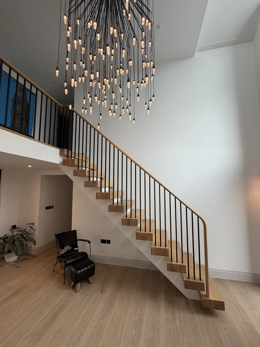 <p>goes the full run of the staircase</p>