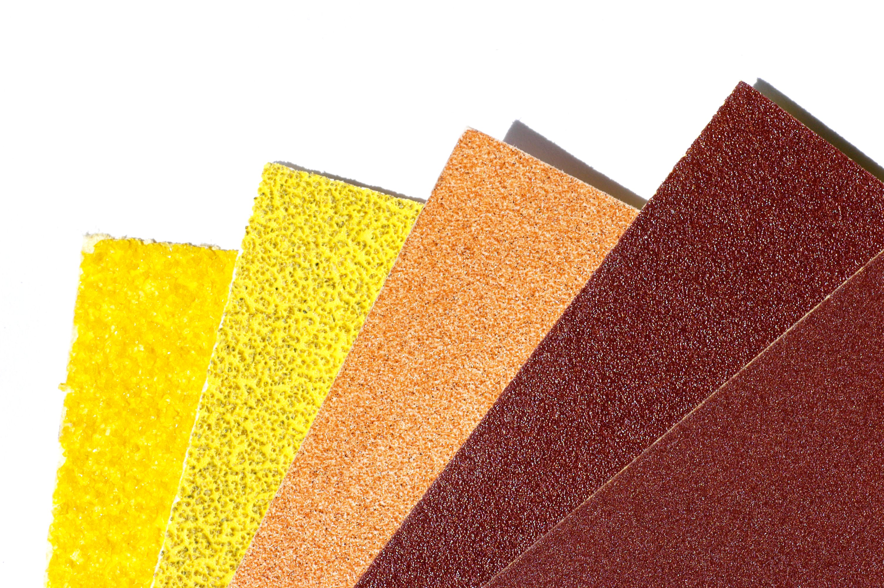 <p>Abrasive paper available in grits ranging from very fine to very coarse, used to smooth, shape, or finish wood, metal, and other surfaces by hand or machine.</p>