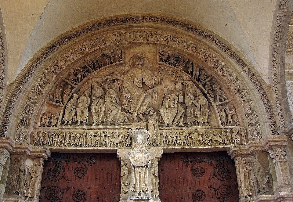 <p>the semi-circular or triangular decorative wall surface over an entrance, door or window, which is bounded by a lintel and an arch</p>