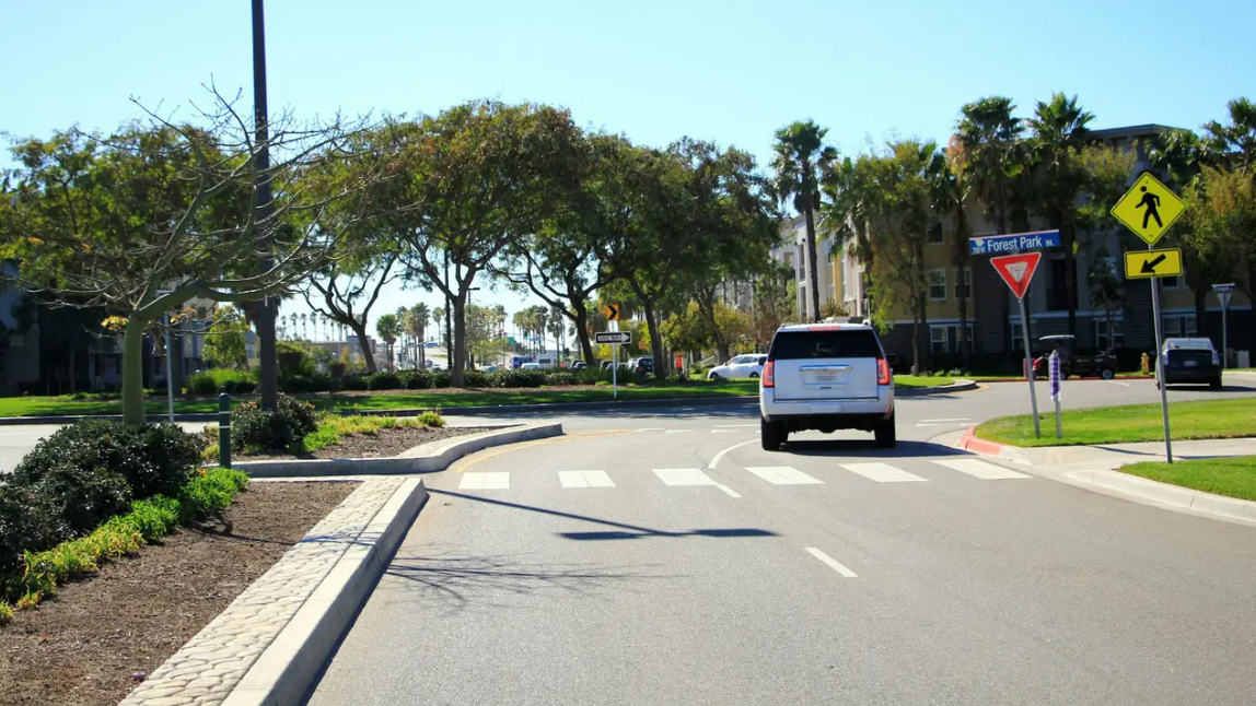 <p>When entering or exiting a roundabout, must drivers yield to pedestrians in the crosswalk?</p>