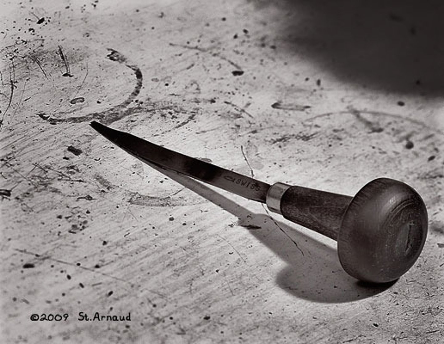 <p>A pointed tool used for engraving or incising.</p>