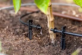 <p>Uses preforated hoses to release small amounts of water to plant roots. Most efficient method of irrigation. 5% lost to evaporation and irrigation. Very expensive = rarely used. Also a solution to waterlogging b/c poke holes in soil = allow air and water to drain through.</p>
