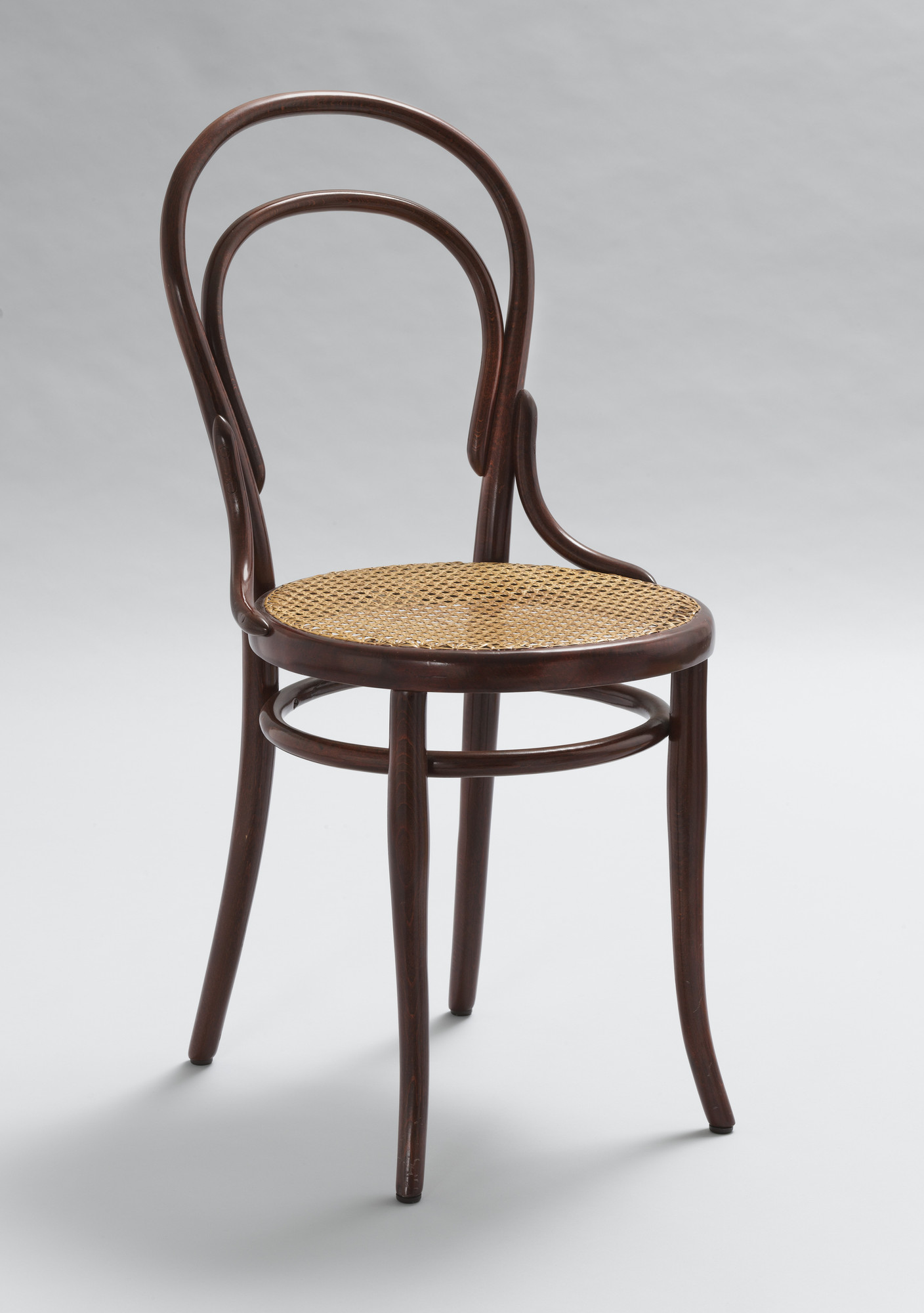 <p>QN=84</p><p>The Michael Thonet's classic café chair, the Model No.14 (image below), with its double-looped back, was essentially a form that was stripped of all superfluous ornamentation. Every element of its steam-bent frame and its caned or molded plywood seat was essential for its function: no more, no less. What style was this chair designed?</p><p>Check one option.</p><p>a. Minimalism</p><p>b. Modernism</p><p>c. Classicism</p><p>d. Biedermeier</p>