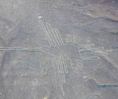 <p><strong><mark data-color="rgba(0, 0, 0, 0)" style="background-color: rgba(0, 0, 0, 0); color: inherit;">a massive design or motif produced on the ground, typically measuring over 4 meters in length, created by arranging stones, gravel, earth, or by removing topsoil to expose contrasting substrate</mark></strong><span>. These art-historical features are often best viewed from the air, serving ceremonial, artistic, or territorial purposes</span></p>