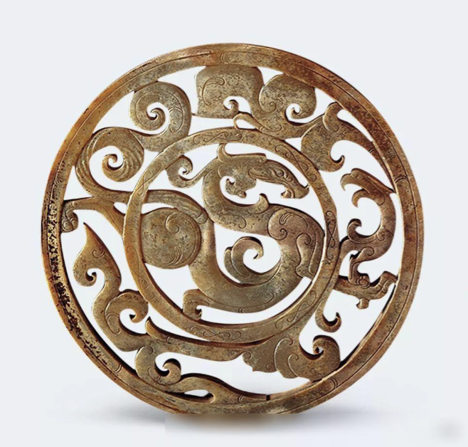 <p><span>Jade disc with phoenix and dragon designs</span></p>