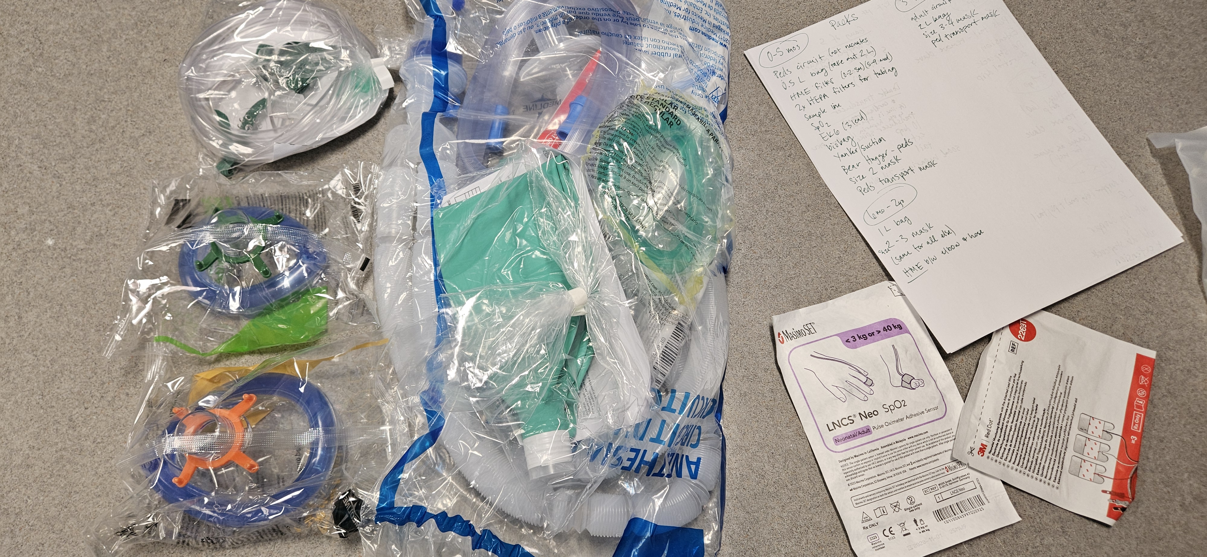 <p>Adult Circuit</p><p><strong>Replace Bag for a 2 L</strong></p><p><strong>Replace Mask for Size 3 &amp; 4</strong></p><p>Peds transport mask</p><p>Purple PulseOx</p><p>3-Lead EKG pads</p><p>Biobag</p>