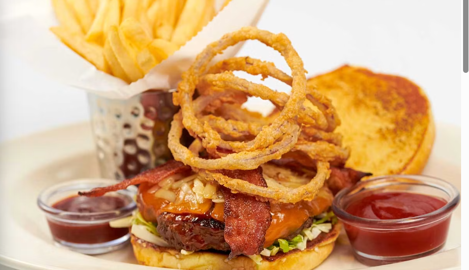 <p>Smoked Bacon and Melted Cheddar with Crispy Onion Strings, B.B.Q. Ranch Sauce and Lettuce</p><p></p>