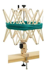 <p>used to wind skeins into balls/cakes</p>