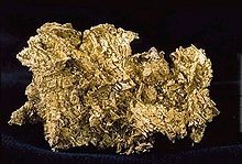 <p>a chemical element that is a good conductor of both electricity and heat and forms cations and ionic bonds with non-metals.</p><p>Found on the left side of the periodic table.</p><p>ex. gold</p>